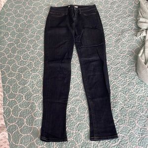 Dark wash skinny jeans. 32” inseam, 15” across the waist